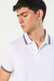 Camiseta unicolor polo con tejido en puños y cuello