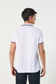 Camiseta unicolor polo con tejido en puños y cuello