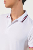 Camiseta unicolor polo con tejido en puños y cuello