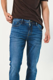 Jean skinny ajustado azul oscuro con tiro bajo y bolsillos