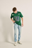 Jean skinny azul claro con rotos delanteros y tiro bajo