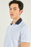 Camiseta unicolor polo con cuello y puños tejidos