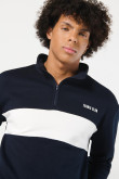 Buzo cuello alto azul oversize college con corte blanco