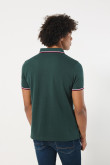 Camiseta polo unicolor con aberturas laterales y botones