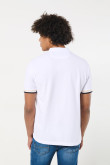 Camiseta polo blanca con puños tejidos y cuello nerú