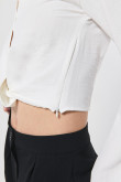 Blusa crop top unicolor manga larga con nudo en cintura