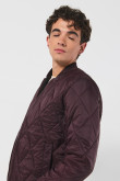 Chaqueta unicolor bomber acolchada con rombos decorativos