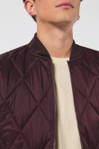 Chaqueta unicolor bomber acolchada con rombos decorativos