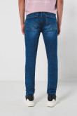 Jean skinny ajustado azul oscuro tiro bajo con 5 bolsillos