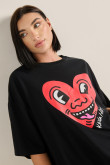 Camiseta manga corta oversize negra y artes de Keith Haring