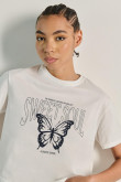 Camiseta unicolor crop top con diseño esotérico de mariposa