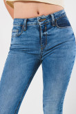 Jean jegging tiro alto azul ajustado con desgastes sutiles