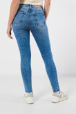 Jean jegging tiro alto azul ajustado con desgastes sutiles