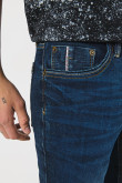 Jean skinny azul oscuro ajustado con bolsillos y tiro bajo