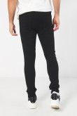 Jean ceñido skinny negro con bolsillos y tiro bajo