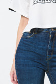 Jean jegging azul oscuro con 5 bolsillos y tiro súper alto