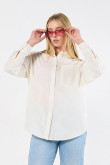 Blusa manga larga unicolor oversize con cuello camisero