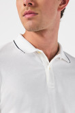 Camiseta unicolor tipo polo manga corta con botones