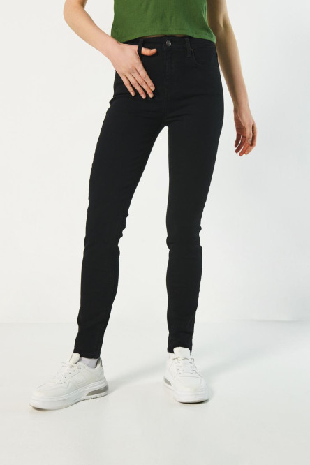 Jean jegging ajustado negro con tiro alto y bolsillos