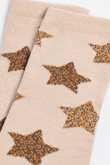 Medias kakis largas con diseños de estrellas de animal print