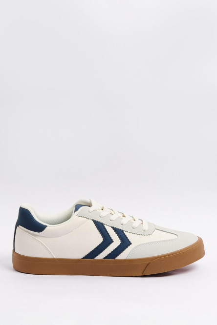 Tenis casuales blancos con contrastes azules y cortes