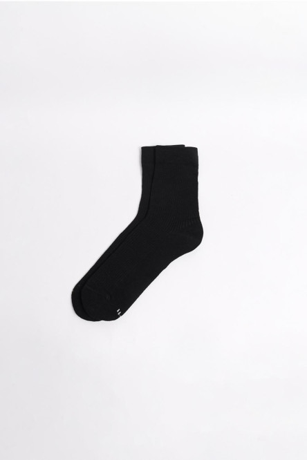 Medias unicolores largas con finas texturas de canal