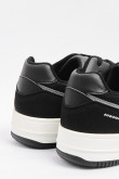 Tenis negros casuales con contrastes y suelas planas