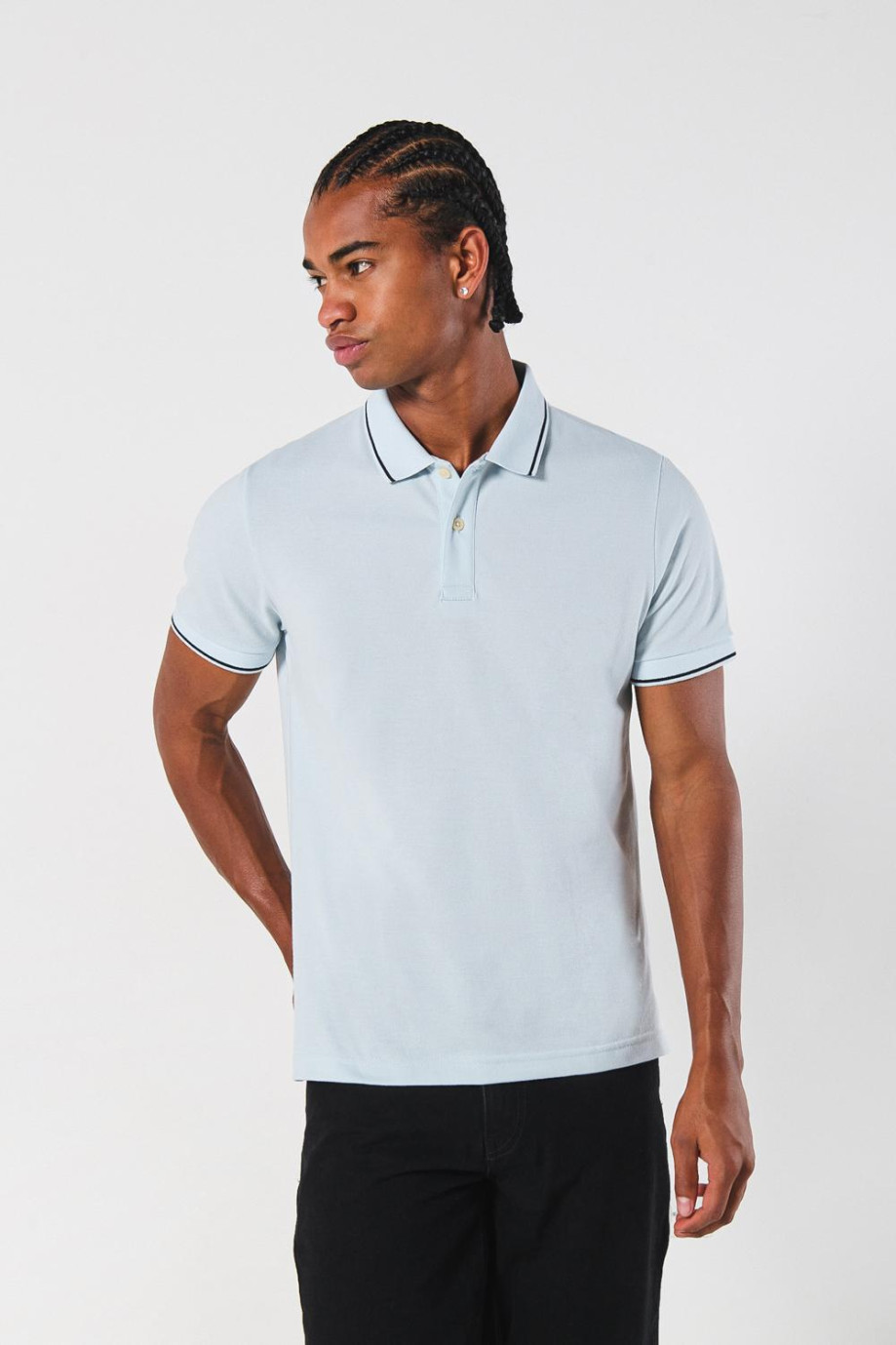 Camiseta unicolor tipo polo manga corta con botones