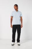 Camiseta unicolor tipo polo manga corta con botones