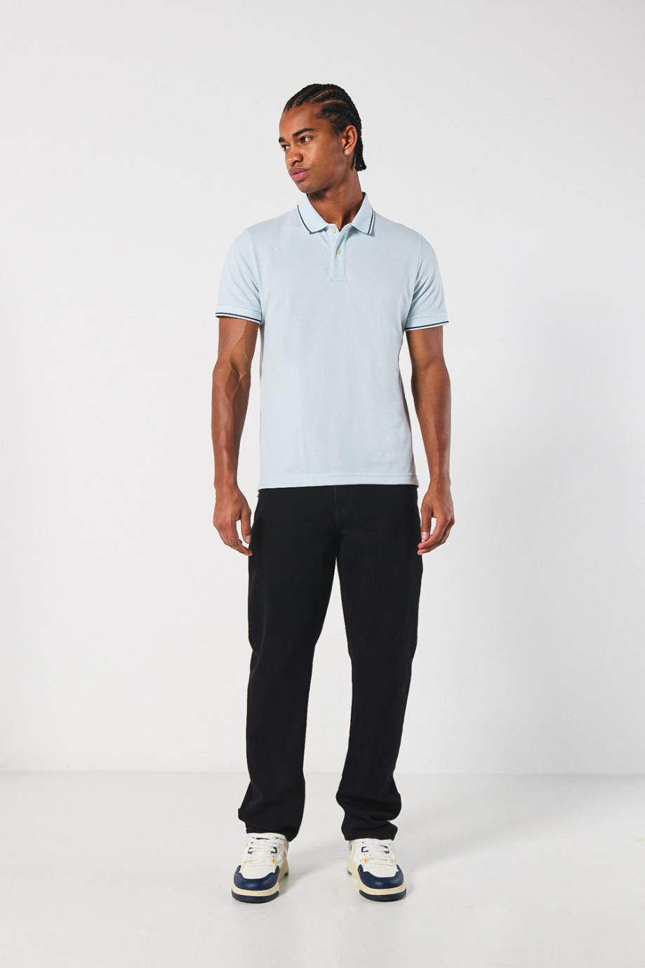Camiseta unicolor tipo polo manga corta con botones