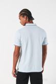 Camiseta unicolor tipo polo manga corta con botones
