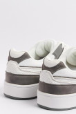 Tenis unicolores casuales con contrastes y perforaciones