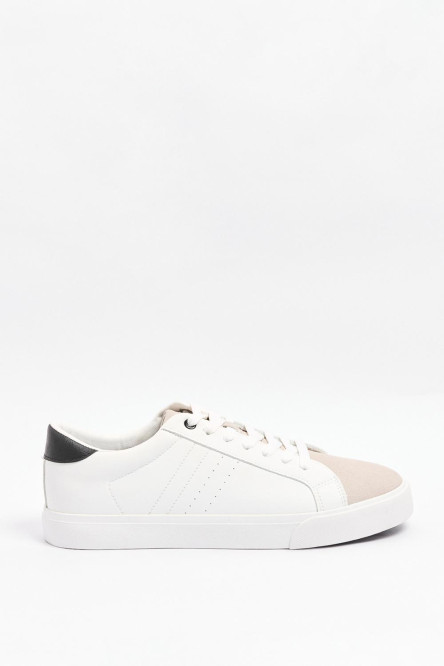 Tenis casuales unicolores con contrastes y perforaciones