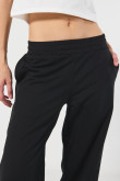 Pantalón jogger unicolor bota recta con bolsillos laterales