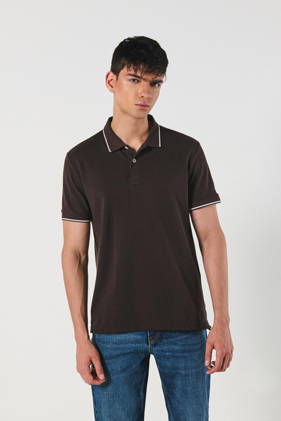 Camiseta unicolor tipo polo manga corta con botones