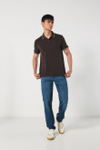 Camiseta unicolor tipo polo manga corta con botones