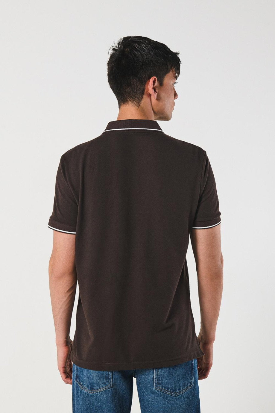 Camiseta unicolor tipo polo manga corta con botones