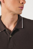 Camiseta unicolor tipo polo manga corta con botones