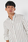 Camisa manga larga unicolor a rayas con cuello button down