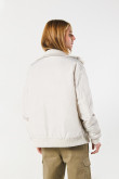 Chaqueta bomber unicolor con cuello alto y bolsillos