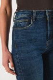 Jean tiro súper alto azul jegging con costuras en contraste