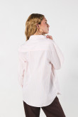 Blusa unicolor oversize a rayas con manga larga