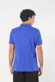 Camiseta unicolor tipo polo con aberturas y manga corta