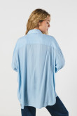 Blusa oversize unicolor con doble bolsillo y manga larga