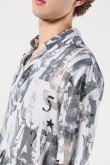 Camisa unicolor estampada con manga corta y cuello sport