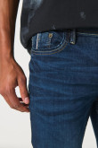 Jean ceñido skinny azul oscuro con bolsillos y tiro bajo