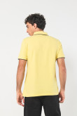 Camiseta polo unicolor con doble botón y manga corta