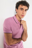 Camiseta polo unicolor con doble botón y manga corta