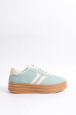 Tenis casuales unicolores con suelas altas y contrastes