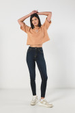 Jean azul jegging ajustado con tiro súper alto y bolsillos